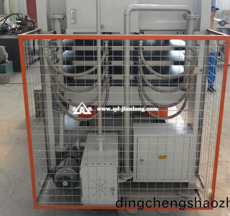 熱(re)壓(ya)機裝(zhuang)配(pei)導熱油鑪